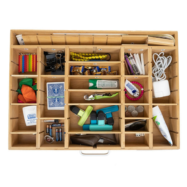 Top view of an Alpha QuickFind drawer with small items sorted into compartments