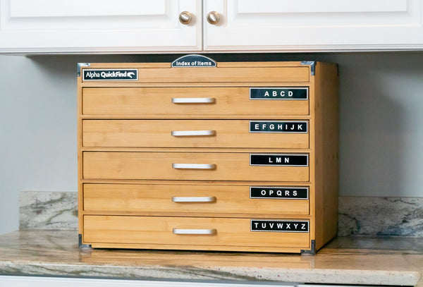 Alpha QuickFind bamboo drawer organizer cabinet on a kitchen counter